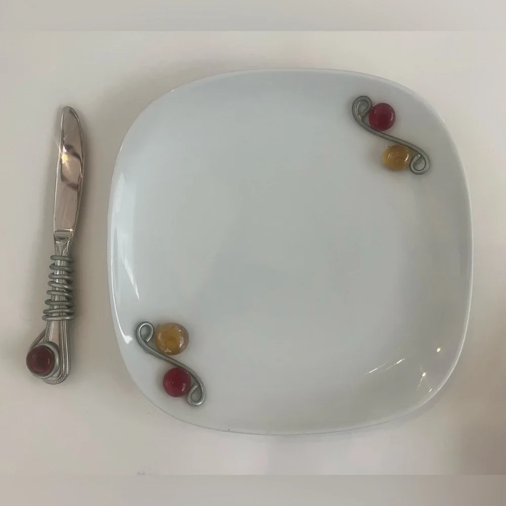 For I heard jeweled plate with silver jeweled knife